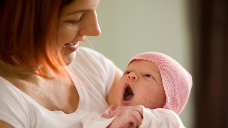 Woman holding baby