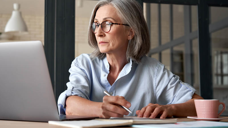 Woman looking at computer