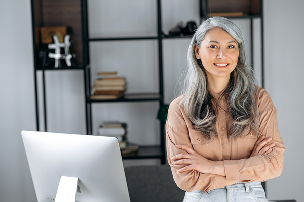 Lady Smiling at computer