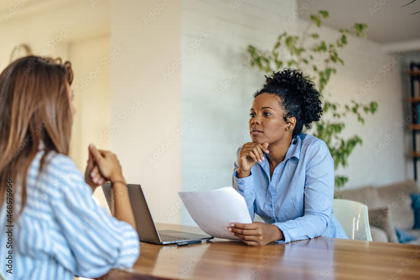 Woman interviewing another woman